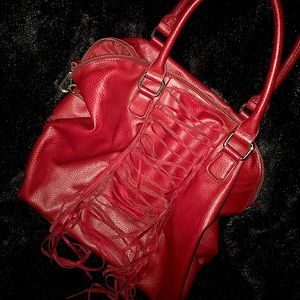 Maroon Fringe Bag From Mark. By Avon double purse handles,Long adjustable strap.